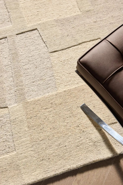 Alfombra beige de lana anudada a mano
