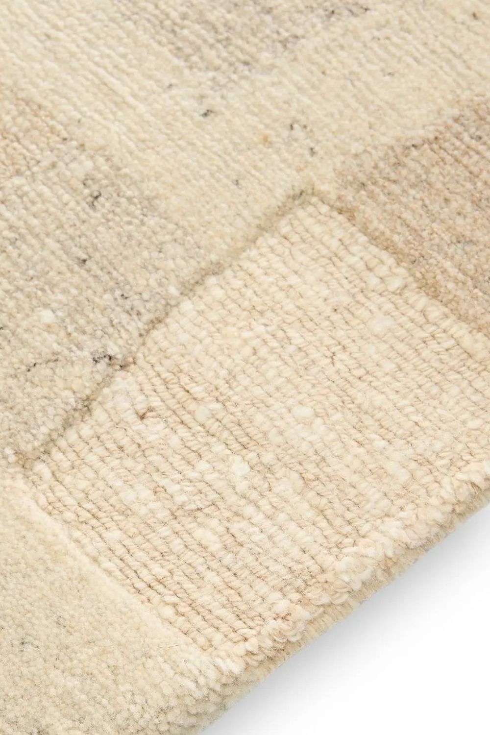 Alfombra beige de lana anudada a mano