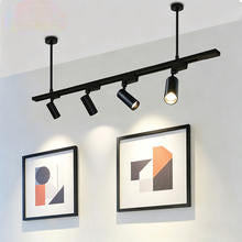 Foco LED direccional para riel con haz ajustable