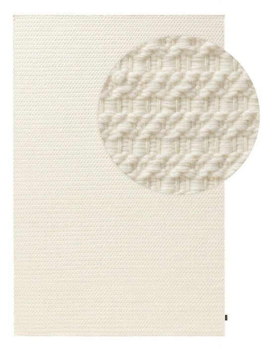 Handwoven wool rug texture