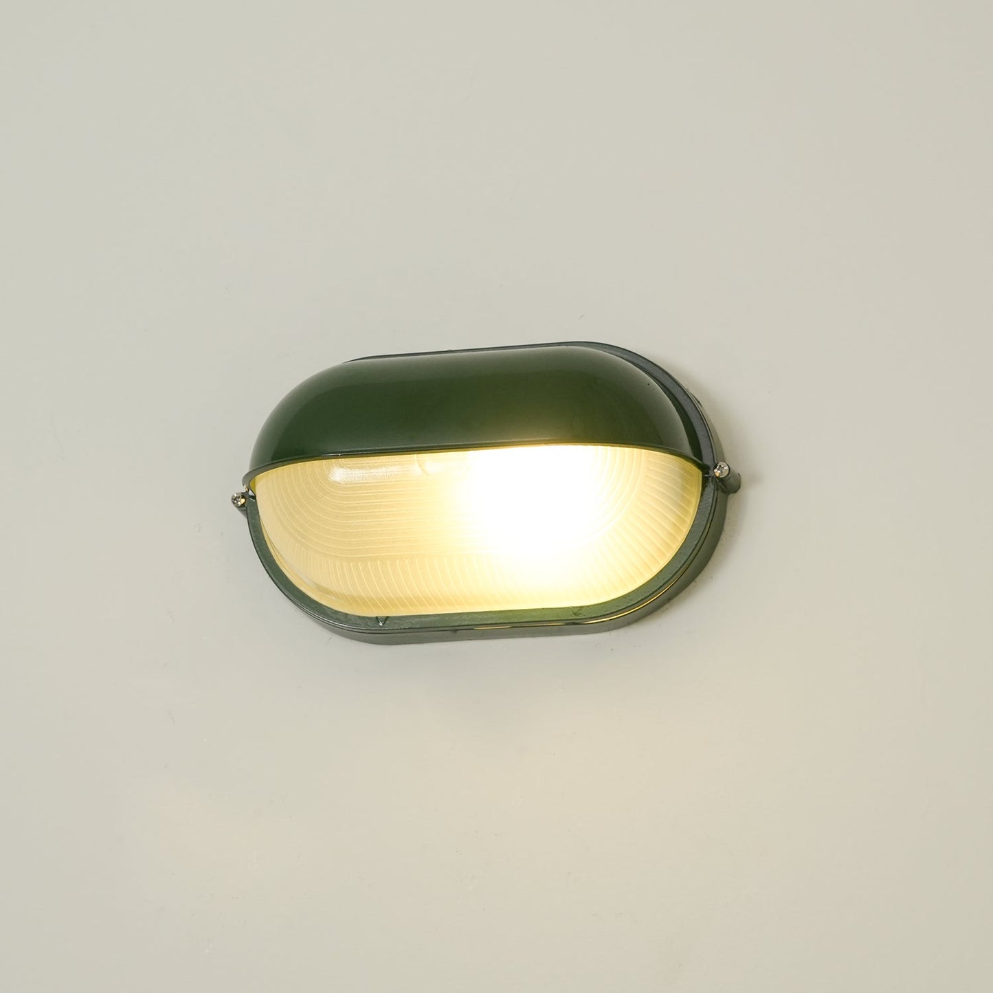 Lámpara de pared industrial para exteriores con vidrio acanalado