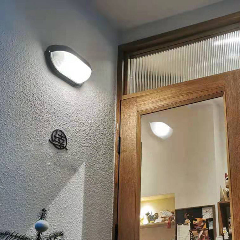 Lámpara de pared industrial para exteriores con vidrio acanalado