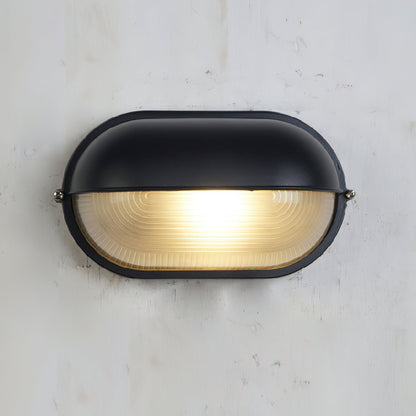 Lámpara de pared industrial para exteriores con vidrio acanalado