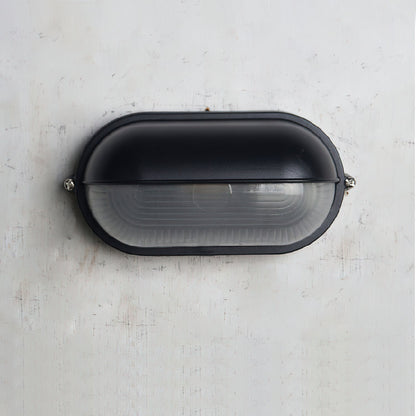 Lámpara de pared industrial para exteriores con vidrio acanalado