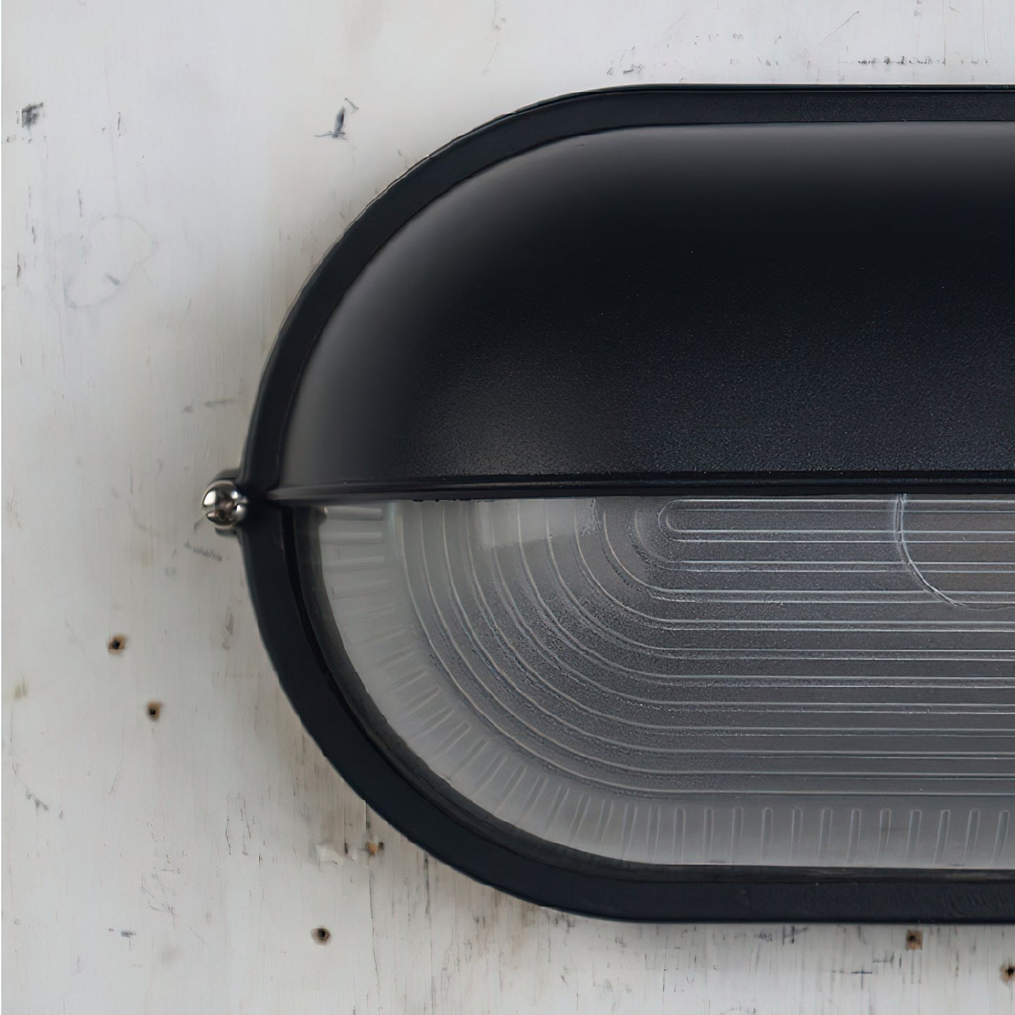 Lámpara de pared industrial para exteriores con vidrio acanalado