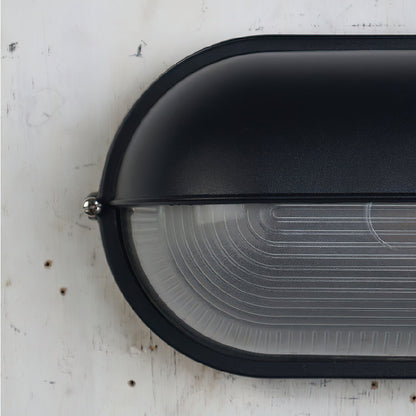 Lámpara de pared industrial para exteriores con vidrio acanalado