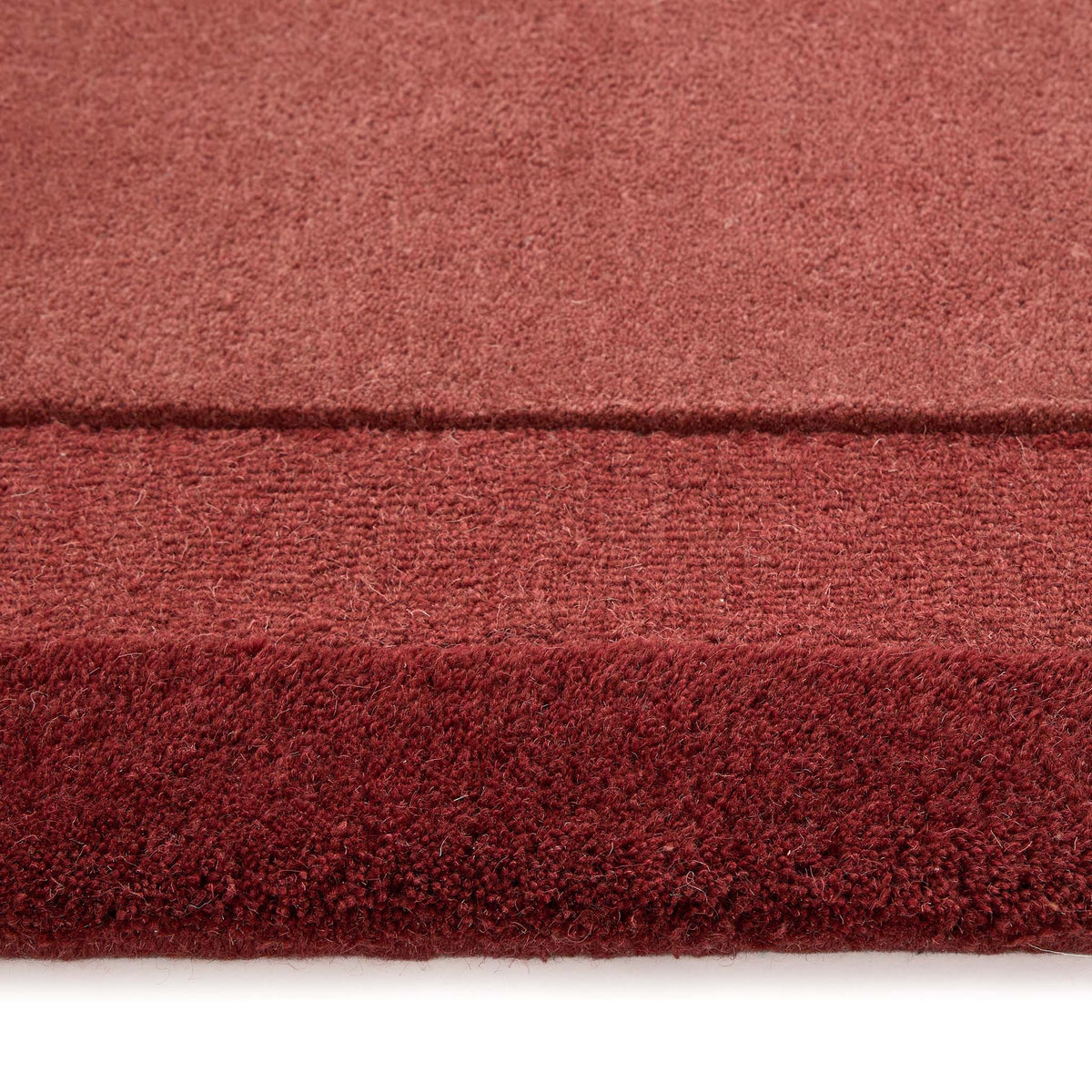 Alfombra de lana moderna con borde Marvella
