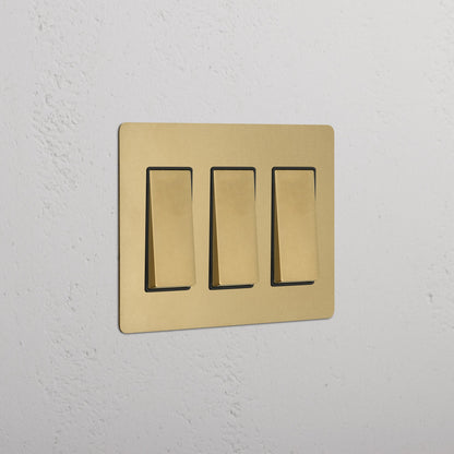 Interruptor basculante de latón minimalista de 3 módulos Quillane