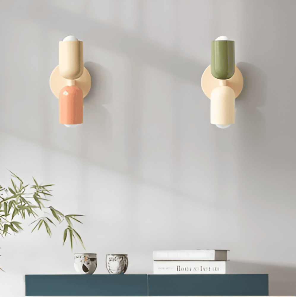 Lámpara de pared de hierro estilo Bauhaus Miravel en forma de cápsula