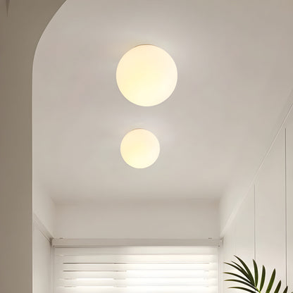 Lámpara de pared Orbelle minimalista de vidrio esmerilado