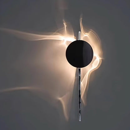 Lámpara de pared escultórica con disco espejado