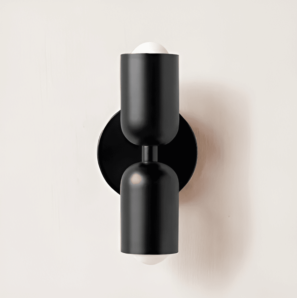 Lámpara de pared de hierro estilo Bauhaus Miravel en forma de cápsula