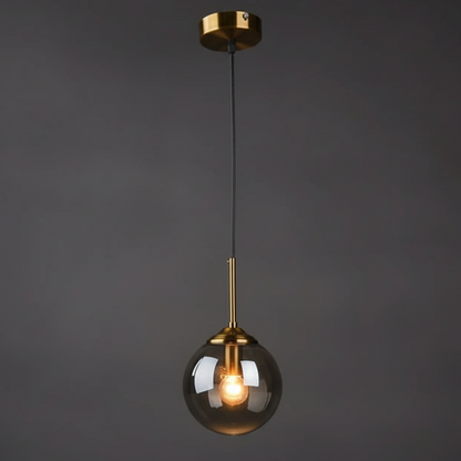 Lámpara colgante Orbelle Art Déco de latón con globo de cristal