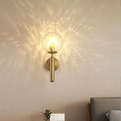 Aplique de pared moderno Ophira con esfera de vidrio