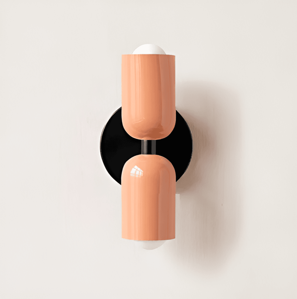 Lámpara de pared de hierro estilo Bauhaus Miravel en forma de cápsula