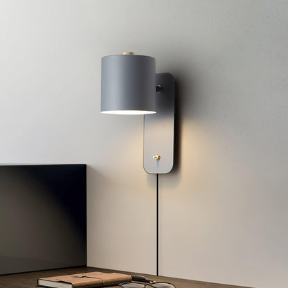 Aplique de pared cilíndrico giratorio con enchufe