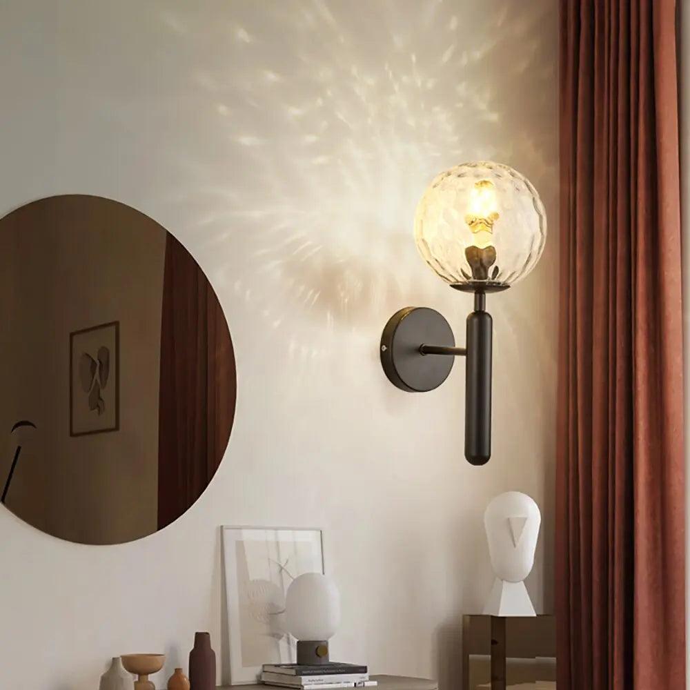 Aplique de pared moderno Ophira con esfera de vidrio