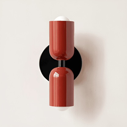 Lámpara de pared de hierro estilo Bauhaus Miravel en forma de cápsula
