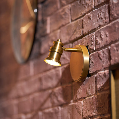 Lámpara de pared tipo foco lineal de latón