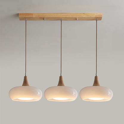 Lámpara colgante de vidrio, madera y guijarros