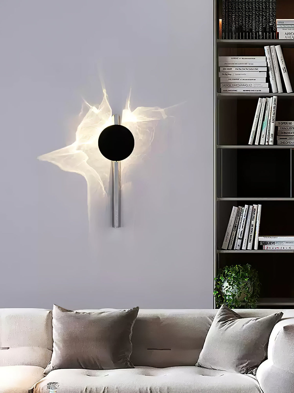 Lámpara de pared escultórica con disco espejado