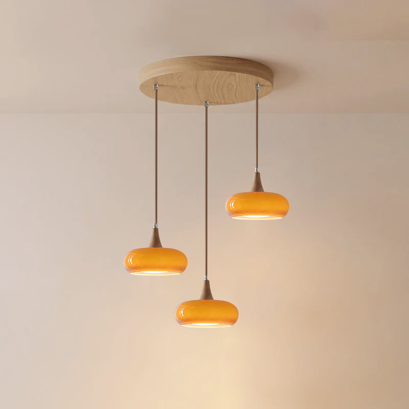 Lámpara colgante de vidrio, madera y guijarros