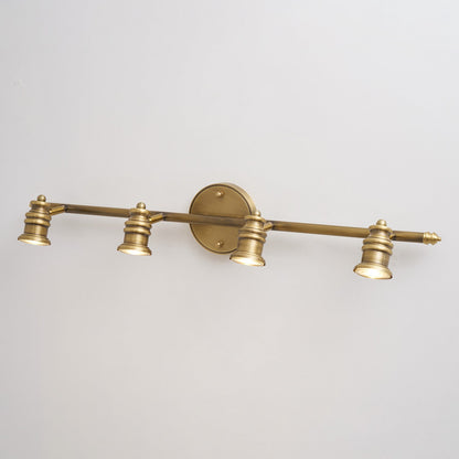 Lámpara de pared tipo foco lineal de latón