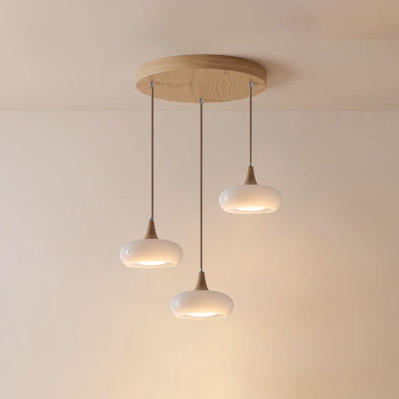 Lámpara colgante de vidrio, madera y guijarros