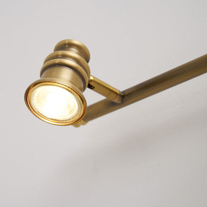 Lámpara de pared tipo foco lineal de latón