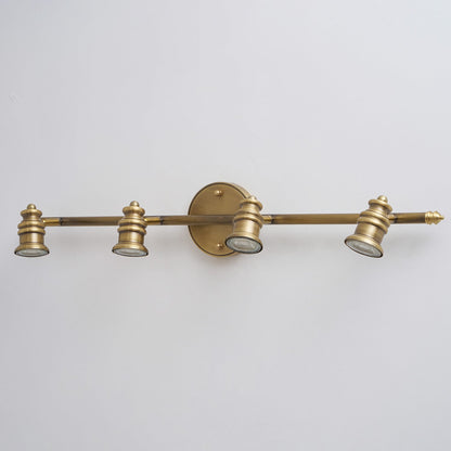 Lámpara de pared tipo foco lineal de latón