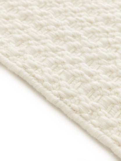 Textura de alfombra de lana tejida a mano
