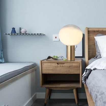 Lámpara de mesa con esfera de vidrio