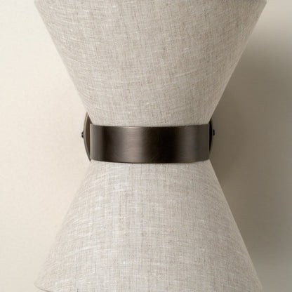 Lámpara de pared de bronce y lino