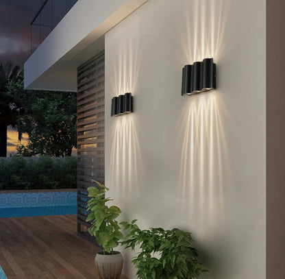 Lámpara de pared exterior moderna con múltiples cabezales