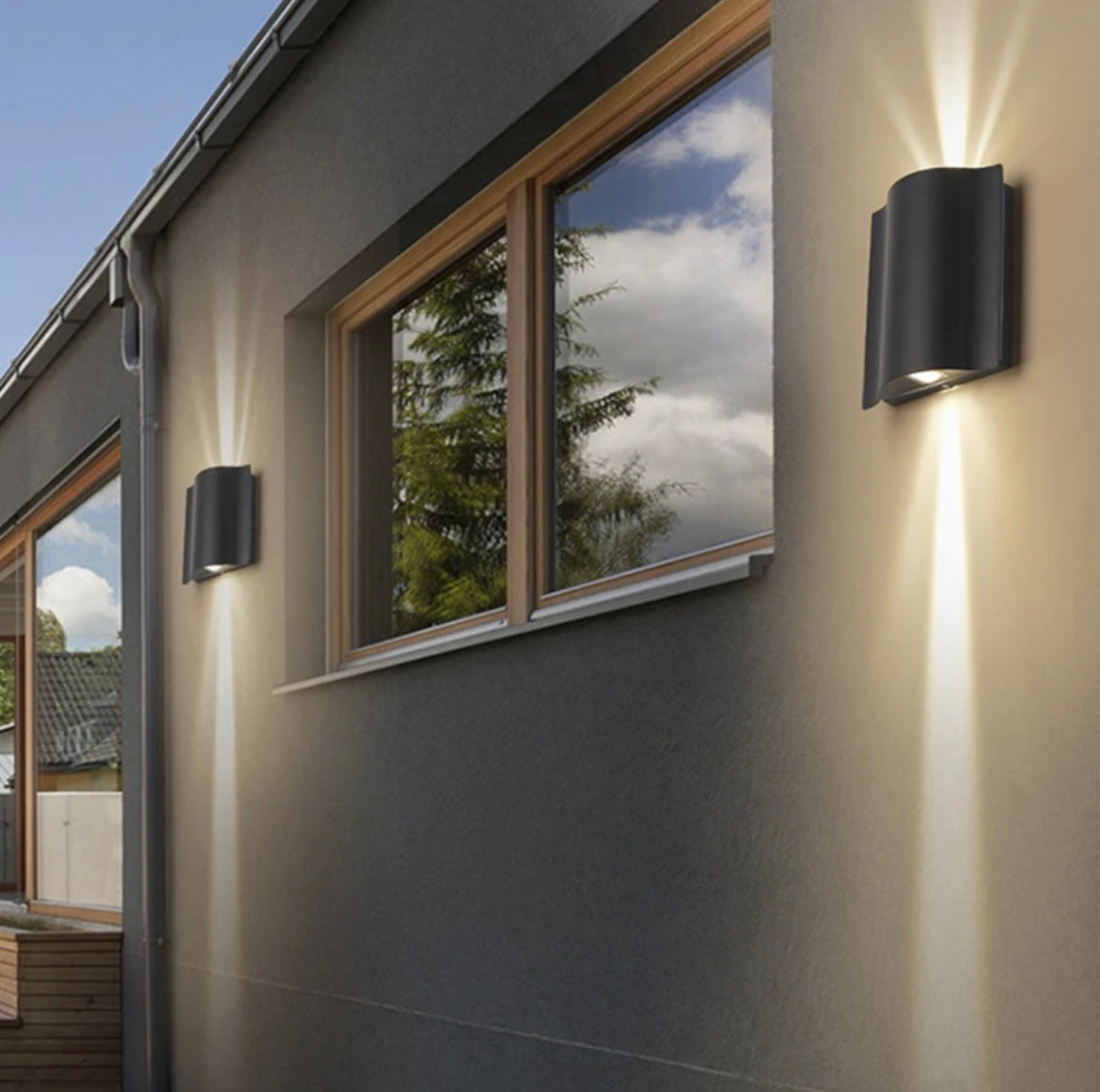Lámpara de pared exterior moderna con múltiples cabezales